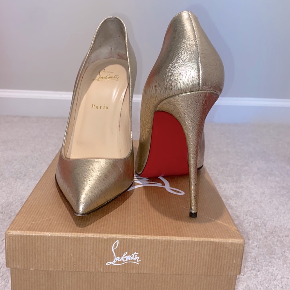 Gold Christian Louboutin heels